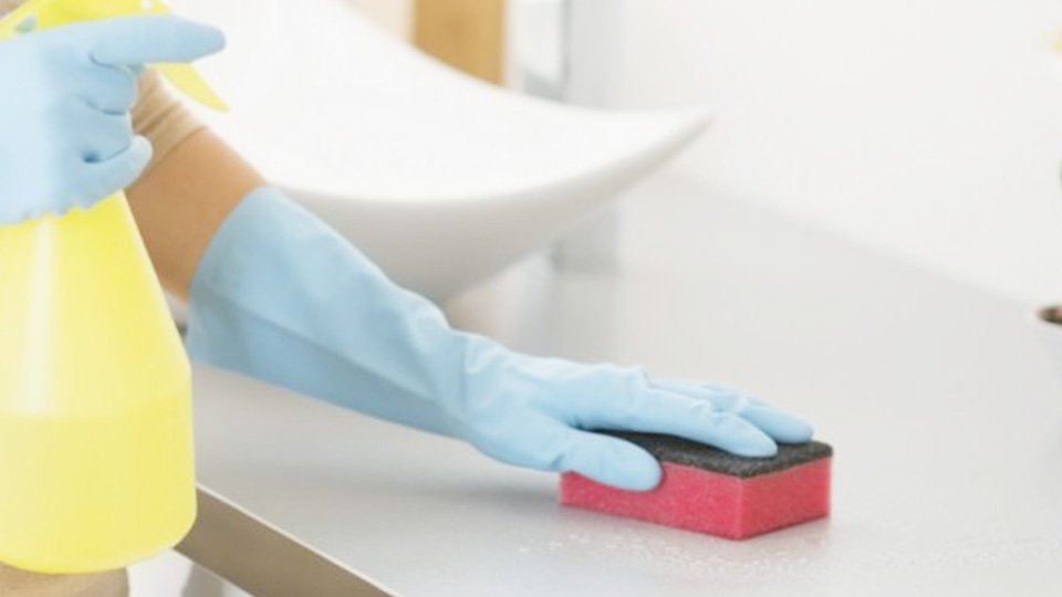 What is the First Step in Cleaning a Bathroom?